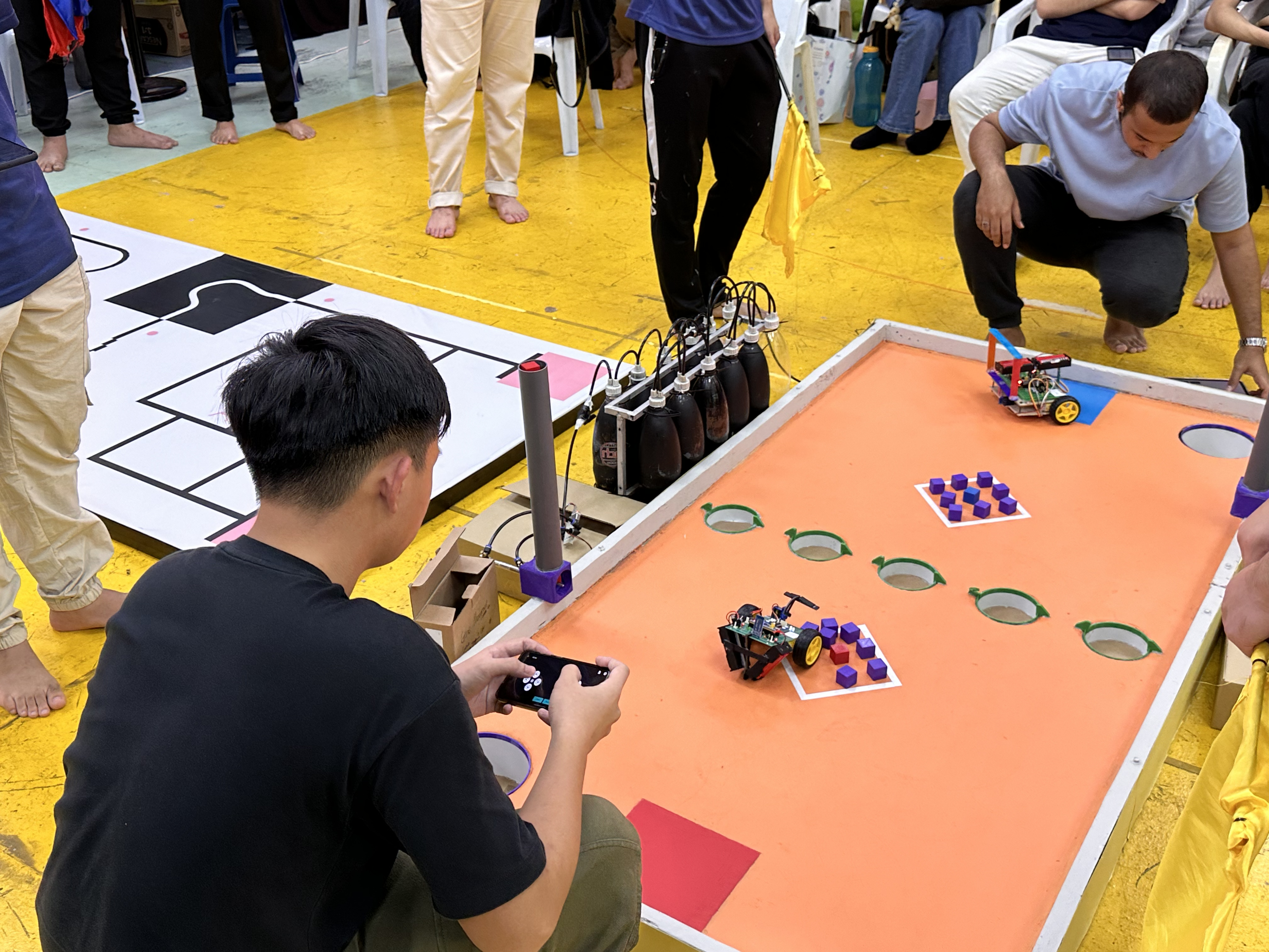 Robot cars competing on track